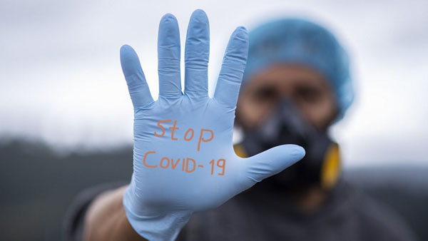 ÜST: Pandemiya 2022-ci ilin əvvəlində sona çatacaq  